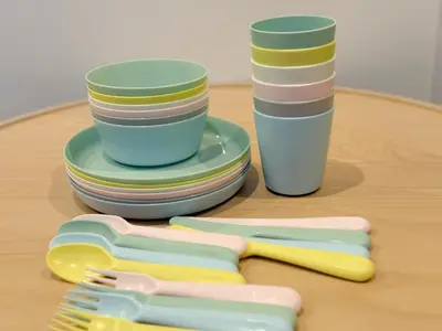 a table with plates and plastic utensils and cups at Central Tokyo Skytree Heven in Tokyo
