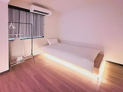 a small room with a bed and a window at Spacious Family Stay Shinagawa-Kokoro House in Tokyo