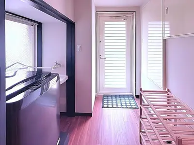 a kitchen with a staircase leading to a door at Spacious Family Stay Shinagawa-Kokoro House in Tokyo