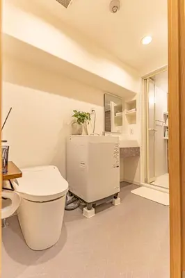 a bathroom with a toilet and a sink at New mansion 5 mins from Yoyogi stations in Tokyo