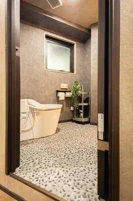 a bathroom with a tub and a toilet and a sink at New mansion 5 mins from Yoyogi stations in Tokyo
