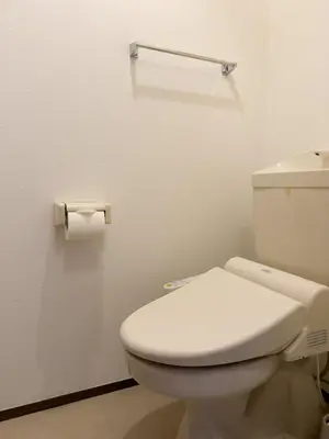 a bathroom with a toilet and a roll of toilet paper at ISSHUKU NOMA\u6c60\u888bII 103 - Quad Room in Tokyo