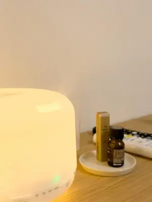 a white computer monitor sitting on a table with medicines at ISSHUKU NOMA\u6c60\u888bII 303 - Quad Room in Tokyo