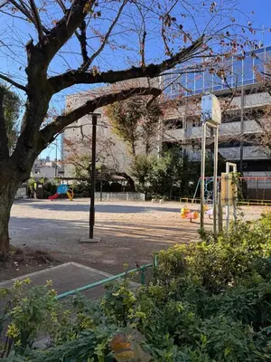 an empty parking lot in front of a building at ISSHUKU NOMA\u6c60\u888bII 305 - Quad Room in Tokyo