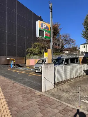 a gas station with a car parked in a parking lot at ISSHUKU NOMA\u6c60\u888bII 305 - Quad Room in Tokyo