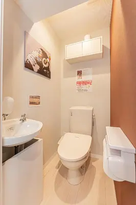 a bathroom with a toilet and a sink at 80m to Aoto Station Elevator Access 35 Min Direct to Haneda Airport Direct Train to Narita Airport Easy Access to Ginza Asakusa Disney Skytree Convenience Store and Pharmacy Downstairs in Tokyo