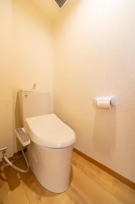 a bathroom with a white toilet in a room at Sky land House Asakusa in Tokyo