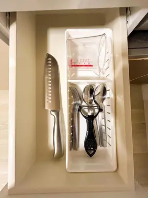 a drawer filled with kitchen utensils and a knife at Shinjyuku area walk to Kabuki cho 15 min in Tokyo