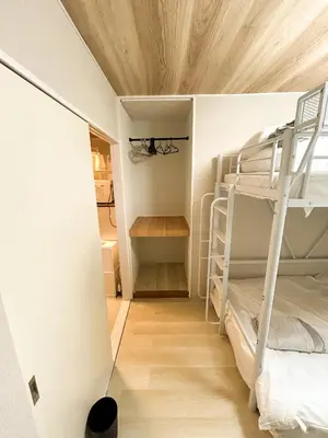 a room with a bunk bed and a ladder at Shinjyuku area walk to Kabuki cho 15 min in Tokyo
