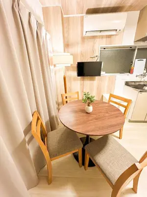 a small table and chairs in a small room at Shinjyuku area walk to Kabuki cho 15 min in Tokyo
