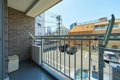 a balcony with a view of a parking lot at 22\u30e1\u30be\u30f3\u30b8\u30e5\u30cd\u30b9 in Tokyo