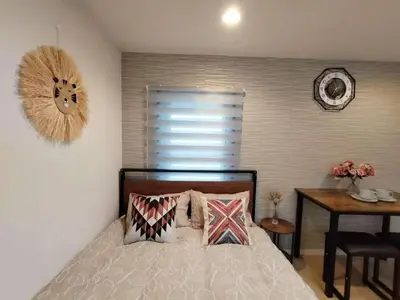 a bedroom with a bed and a desk and a table with a table at Shinjuku center area-\u65b0\u5927\u4e45\u4fdd\u7ad94\u5206-\u65b0\u5bbf10\u5206-2room-Loft-Max5p-\u76f4\u8fbe\u6d89\u8c37\u4e0a\u91ce\u539f\u5bbf\u94f6\u5ea7 in Tokyo