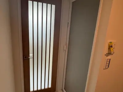 a door with bars on it in a room at \u3055\u304f\u3089\u65c5\u9928 \u9ad8\u5186\u5bfa\u5317\u5343\u5229\u4f11 301\u53f7\u5ba4 in Tokyo