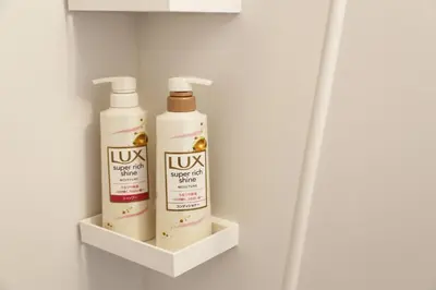 two bottles ofodorizers on a shelf in a bathroom at PR203 Winter Tokyo Shinjuku Xmas Lights New Year Shrine in Tokyo