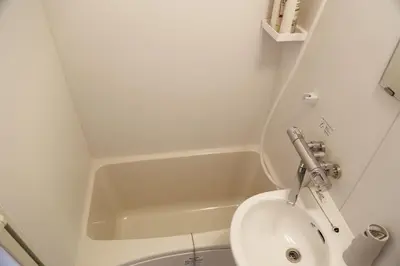 a white bathroom with a toilet and a sink at PR203 Winter Tokyo Shinjuku Xmas Lights New Year Shrine in Tokyo