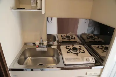 a small kitchen with a sink and a stove at PR203 Winter Tokyo Shinjuku Xmas Lights New Year Shrine in Tokyo