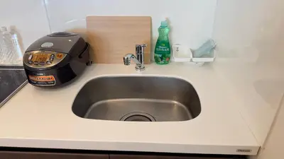 a kitchen counter top with a sink and a toaster at YIYou Japan\u79cb\u8449\u539f401 in Tokyo