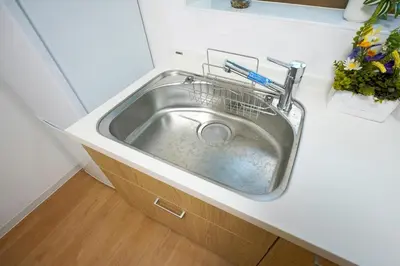 a silver sink in a counter in a bathroom at BT House Bentencho Shinjuku Waseda in Tokyo