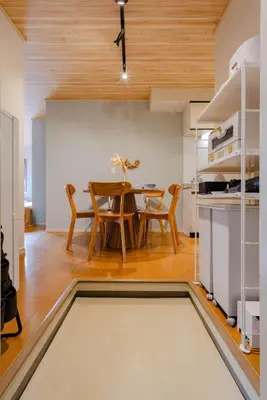 a kitchen and dining room with a table and chairs at Maison Shin Nakano 201 MS21 in Tokyo