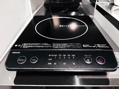 a control panel of a stove top oven at Shibuya 10 min Walk Theater & Garden Stay Max 6ppl in Tokyo