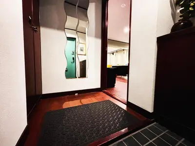 a room with a door with a mirror and a hallway at Shibuya 10 min Walk Theater & Garden Stay Max 6ppl in Tokyo