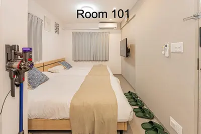 a hospital room with a bed and a camera at 5-Min Walk to Yamanote Line, Newly Renovated APT in Prime Location, Quiet Neighborhood in Tokyo