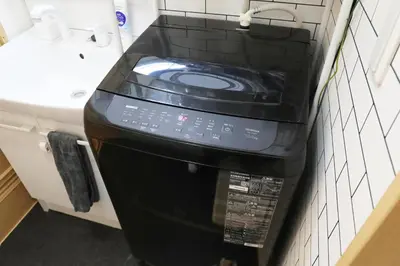 a toaster oven in a bathroom next to a sink at Cozy house Tokyo in Tokyo