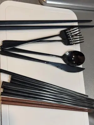 a group of utensils sitting on top of a drawer at \u3055\u304f\u3089\u65c5\u9928 \u9ad8\u5186\u5bfa\u5317\u5343\u5229\u4f11 501\u53f7\u5ba4 in Tokyo