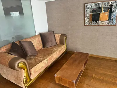 a living room with a couch and a coffee table at staytokyo1107 ONE bedroom in Tokyo