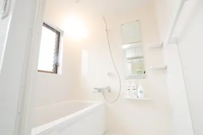 a white bathroom with a shower and a sink at Ikebukuro# Nakaitabashi 3DK room# 5 minutes walk from station in Tokyo