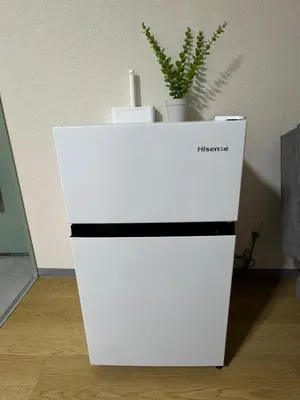 a white cabinet with a plant on top of it at \u5c71\u624b\u7dda\u5927\u585a in Tokyo