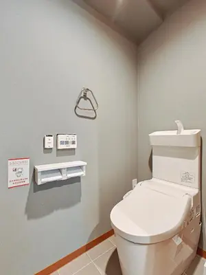 a bathroom with a white toilet in a room at Hamanoya Main in Tokyo