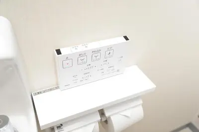 a bathroom with a white toilet with a white counter at NY House 2\u65b0\u5bbf\u4e09\u968e\u5efa\u30663\u5ba42\u30b7\u30e3\u30ef\u30fc2\u30c8\u30a4\u30ec in Tokyo