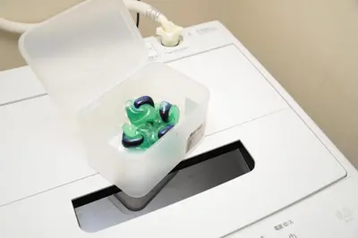 a machine with a piece of green dye in it at NY House 2\u65b0\u5bbf\u4e09\u968e\u5efa\u30663\u5ba42\u30b7\u30e3\u30ef\u30fc2\u30c8\u30a4\u30ec in Tokyo