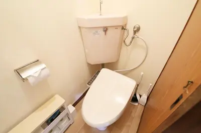 a small bathroom with a toilet and a sink at Shitamachi Skyroom in Yotsugi Private Room in Tokyo