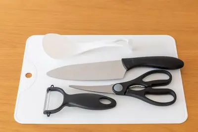 a pair of scissors sitting on a white tray at Oji Inn \u738b\u5b50\u30a4\u30f3 in Tokyo