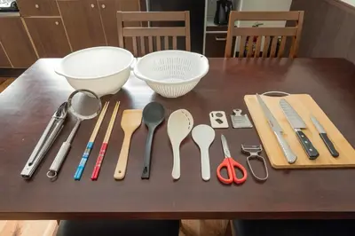 a table with a bunch of spoons and bowls on it at SAKURA villa \uff21166 in Tokyo