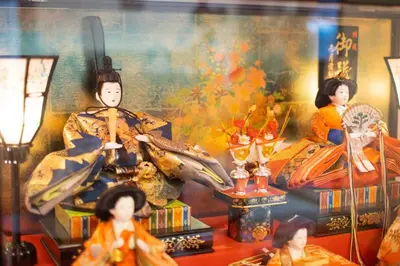 a group of dolls in a room with a painting at SAKURA villa \uff21166 in Tokyo
