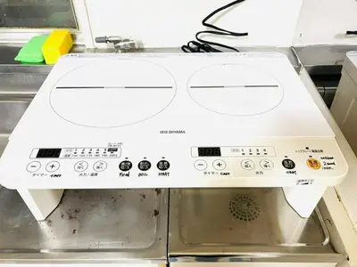 a white machine sitting on top of a table at 1min from station Hokusai and 2F nice view 2DK 30min from Tokyo station convenience store 30sec onsen 10min Haneda 55min in Tokyo
