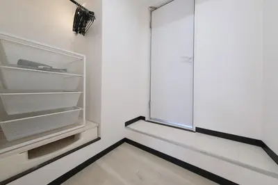 an empty refrigerator in a room with a window at Good access to Shinjuku! Japandi Style Room in Nakano, Tokyo - Podhouse Nakano in Tokyo