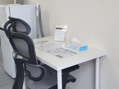 a white desk with a chair and a box on it at 2 Units in 1 Listing near Nakano CBD and Broadway in Tokyo