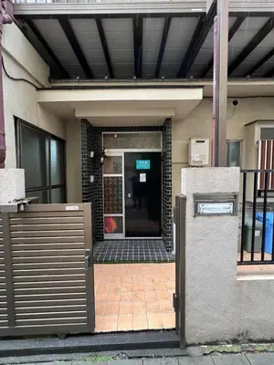 a front door of a building with a gate at Core of Tokyo, 30 mins from Shinjuku & Ueno, LARGE in Tokyo