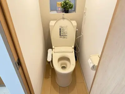 a small bathroom with a toilet in a stall at Shinjuku Area 41 Shinjuku Apartment in Tokyo
