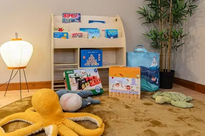 a room with toys and books on the floor at 200 m2 Modern Japanese style private 6LDK House in Tokyo