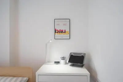 a room with a desk with a ball rolls sign on the wall at 3min walk to Asagaya Sta, Cozy Private Studio Direct access 8min to Shinjuku, 30min to Akihabara and Asakusa in Tokyo