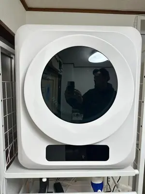 a man taking a picture in a bathroom mirror at 3min walk to Asagaya Sta, Cozy Private Studio Direct access 8min to Shinjuku, 30min to Akihabara and Asakusa in Tokyo