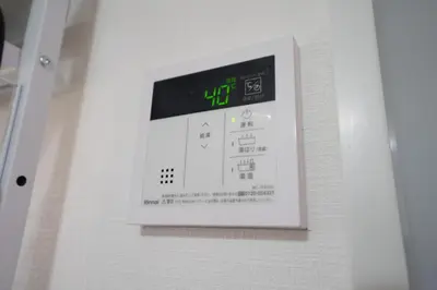 a digital clock on a white wall at 3min walk to Asagaya Sta, Cozy Private Studio Direct access 8min to Shinjuku, 30min to Akihabara and Asakusa in Tokyo