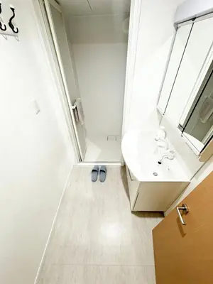 a bathroom with a sink and a mirror at Opening in December Riverside stay to Akihabara Shinjuku in Tokyo