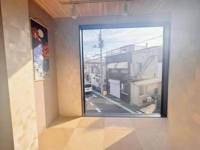 a room with a window with a view of a street at Opening in December Riverside stay to Akihabara Shinjuku in Tokyo