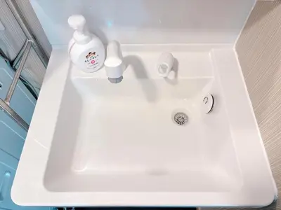 a white sink with a bottle of soap on it at 301, 6 min walk to subway stn, Tokyo Univ, Tokyo Tower, Tokyo-Dome direct by subway in Tokyo